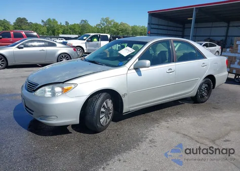 2004 Toyota Camry Le z USA, uszkodzony, nr VIN 4T1BE32K04U319290